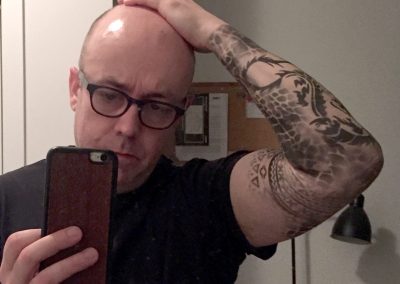 Shaved Head and Face with Fake Sleeve Tattoos